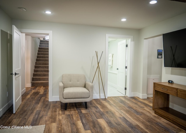 living area with dark wood-type flooring