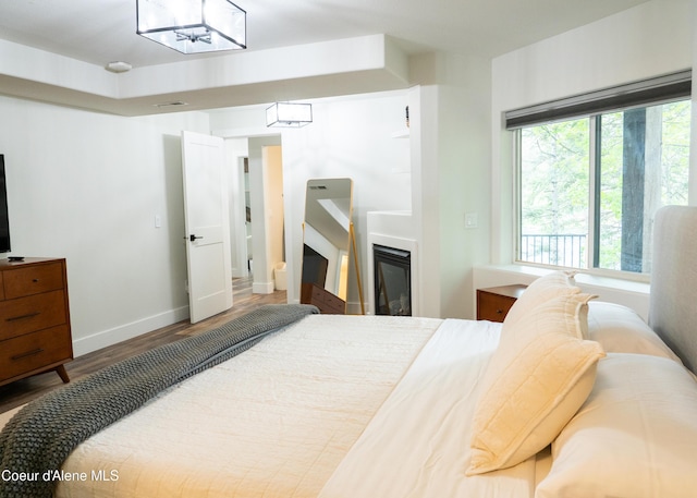 bedroom featuring hardwood / wood-style flooring