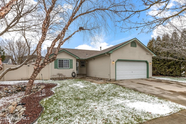 ranch-style home with a garage