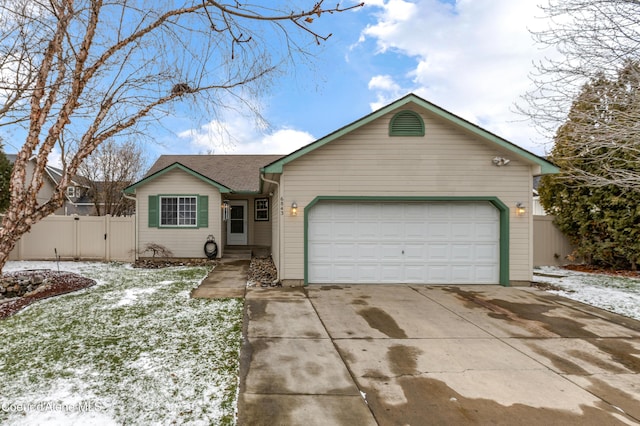 single story home featuring a garage