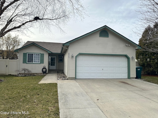 single story home with a garage, concrete driveway, a front lawn, and fence