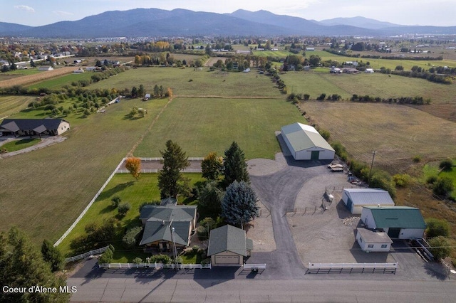 aerial view featuring a rural view and a mountain view