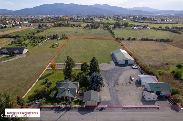 drone / aerial view featuring a mountain view