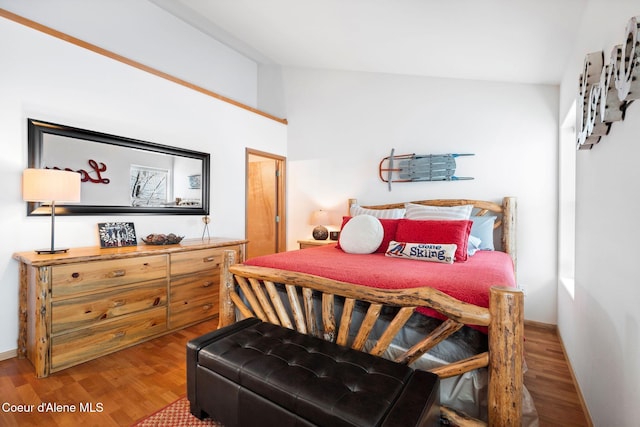 bedroom with wood-type flooring