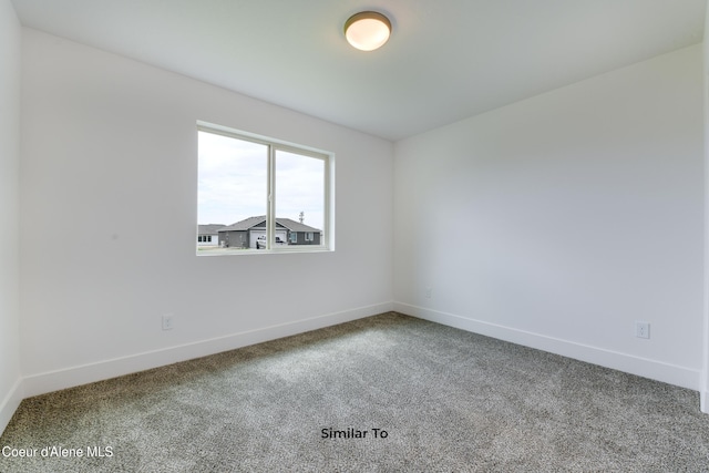 spare room with carpet flooring