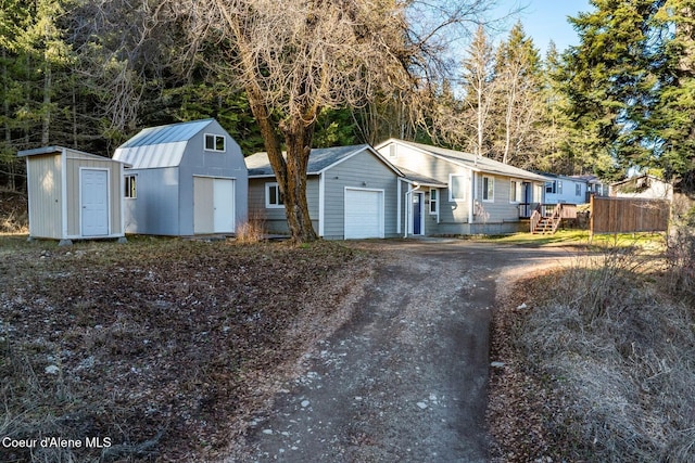 view of front of property featuring a storage unit