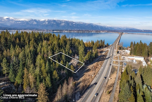 aerial view with a water and mountain view