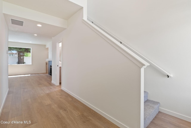 1605 N Garvin Ct, Spokane Valley, WA 99016 - hallway with stairway, light wood-type flooring, recessed lighting, and baseboards