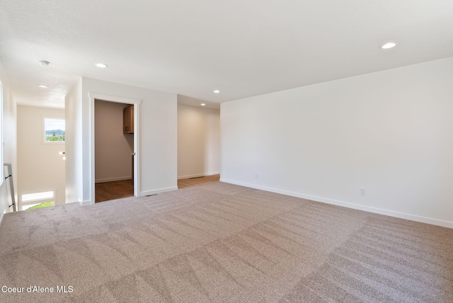 1605 N Garvin Ct, Spokane Valley, WA 99016 - carpeted empty room with recessed lighting and baseboards
