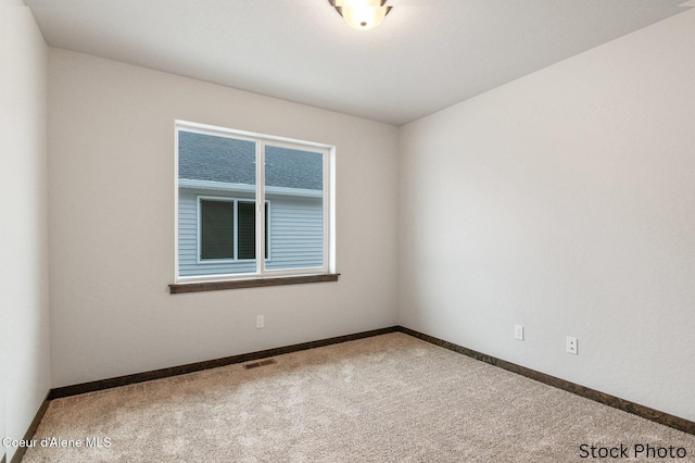 view of carpeted spare room