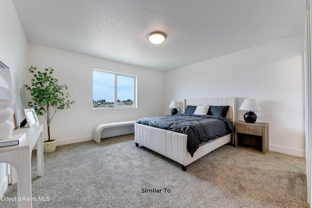 bedroom featuring carpet flooring