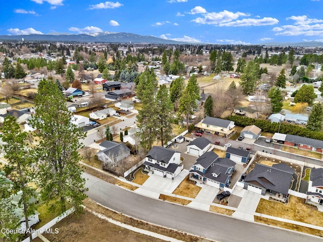 aerial view featuring a mountain view and a residential view