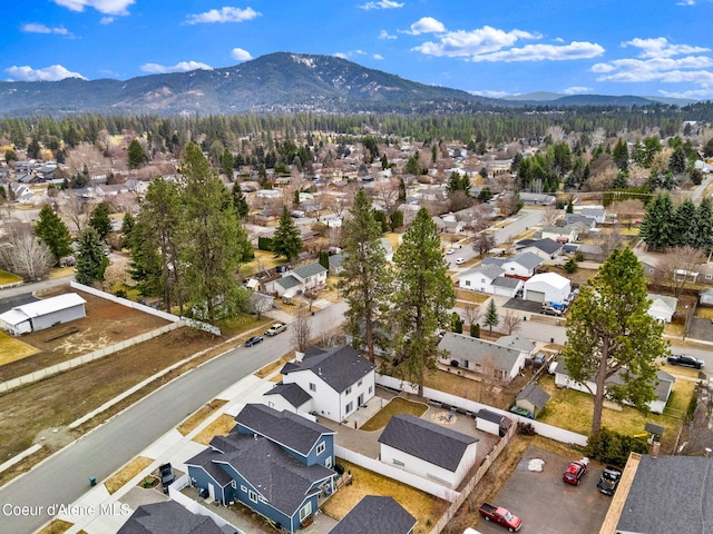 aerial view featuring a mountain view and a residential view