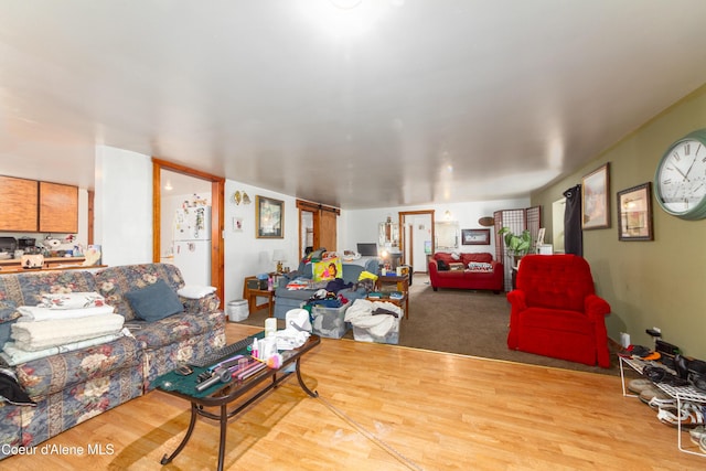 living room with light hardwood / wood-style floors