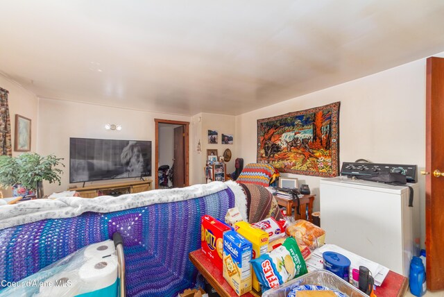 living room with washer / dryer