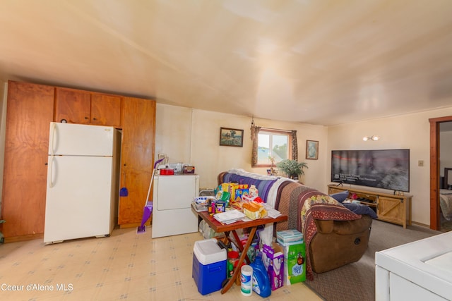 living room with washer / clothes dryer