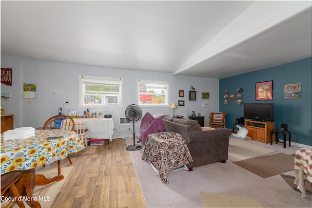 living room with light hardwood / wood-style flooring