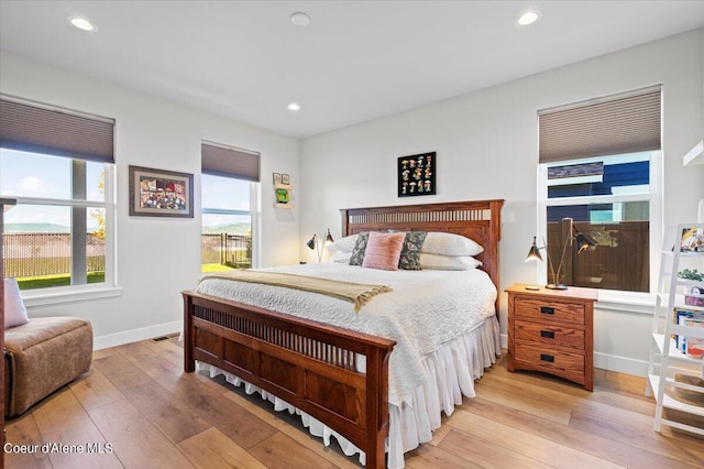 bedroom with light wood-type flooring