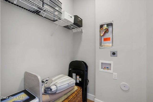 washroom featuring electric dryer hookup and washer hookup