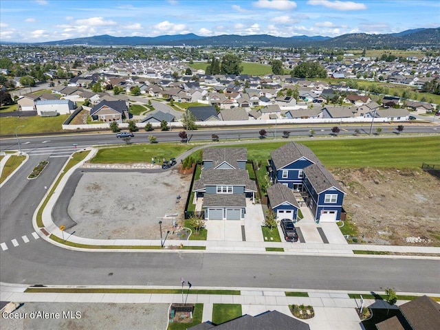 drone / aerial view featuring a mountain view