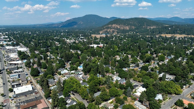 birds eye view of property featuring a mountain view