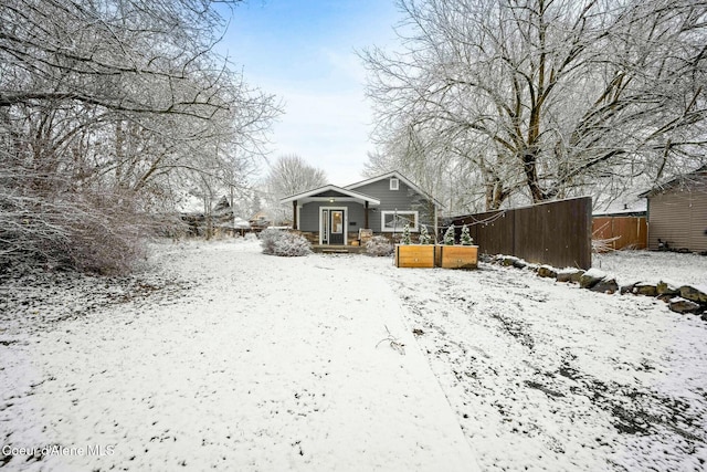 view of yard covered in snow