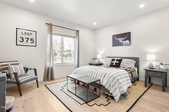 bedroom featuring light hardwood / wood-style flooring