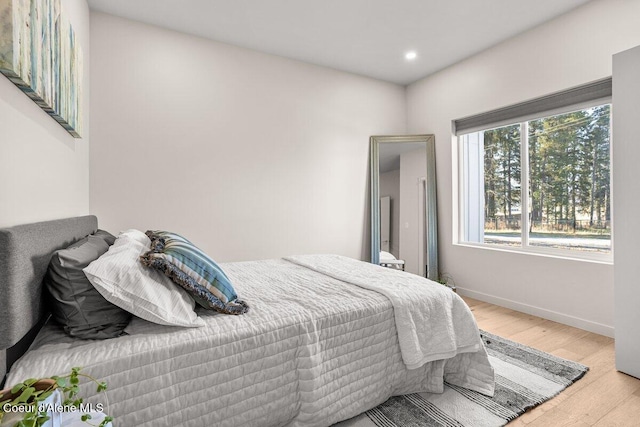 bedroom featuring light wood-type flooring