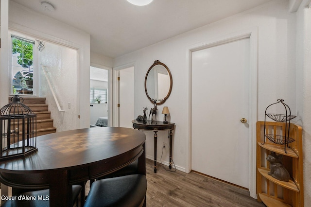 dining area with dark wood-type flooring