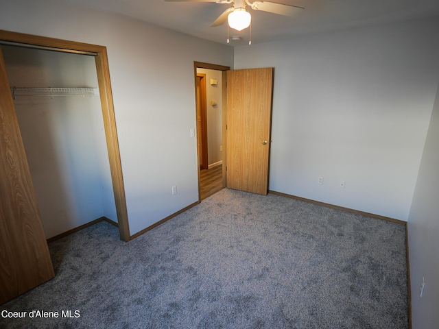 unfurnished bedroom featuring ceiling fan, a closet, and carpet floors