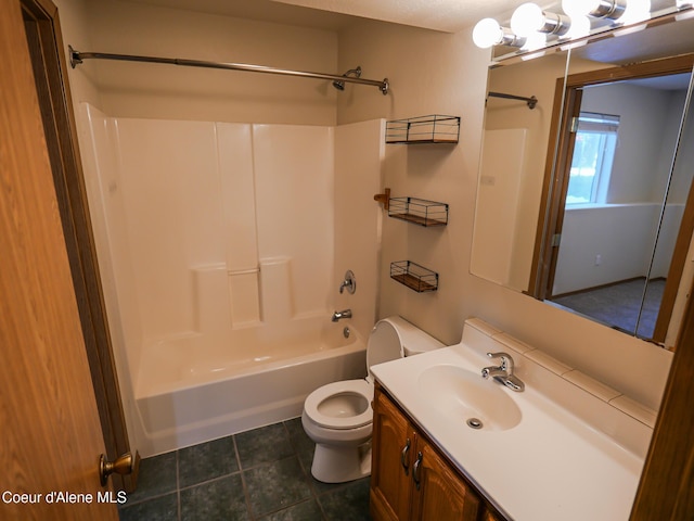 full bathroom featuring toilet, vanity, and shower / washtub combination