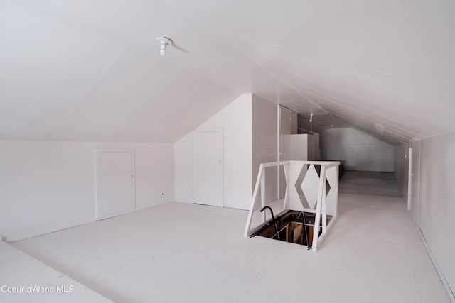 bonus room featuring lofted ceiling