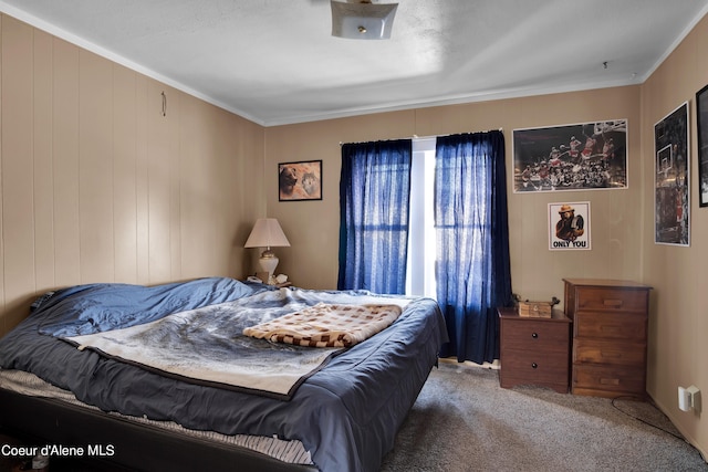 bedroom featuring carpet and ornamental molding