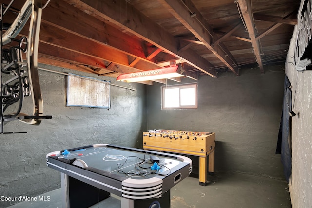 playroom featuring concrete floors