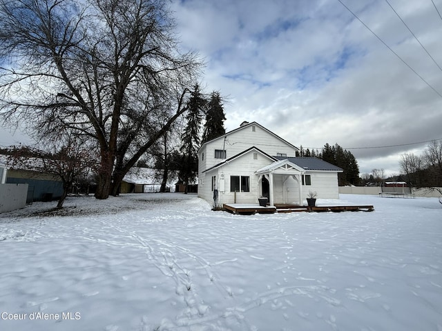 view of front of property featuring a wooden deck