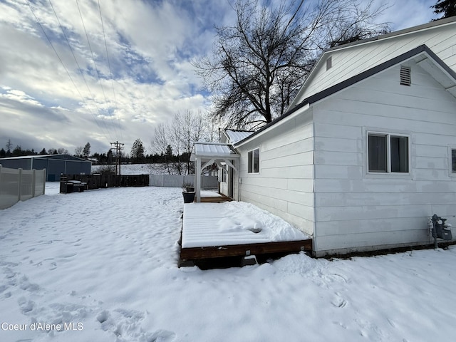 view of yard layered in snow