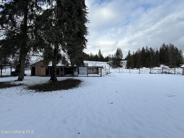 view of yard covered in snow