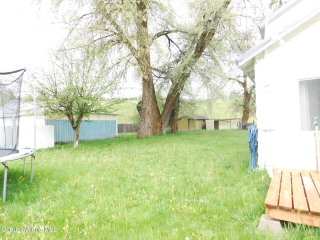 99 Brown Creek Rd, Naples, ID 83847 - view of yard with a trampoline, a shed, and an outdoor structure
