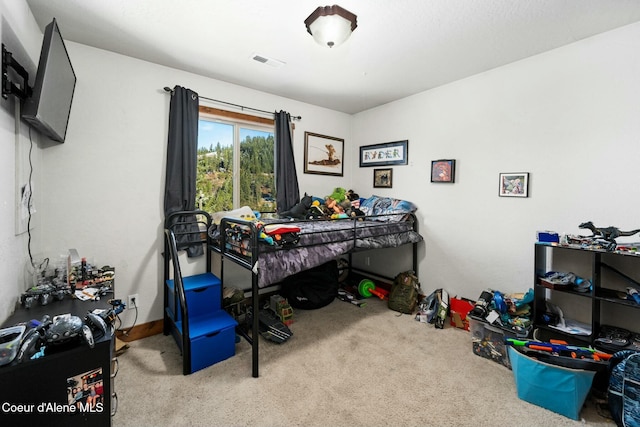 bedroom featuring carpet floors