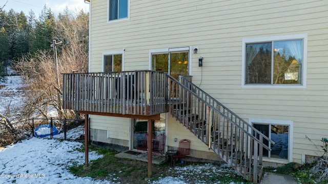 view of snow covered property