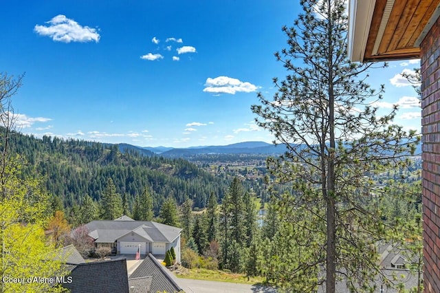 property view of mountains with a forest view