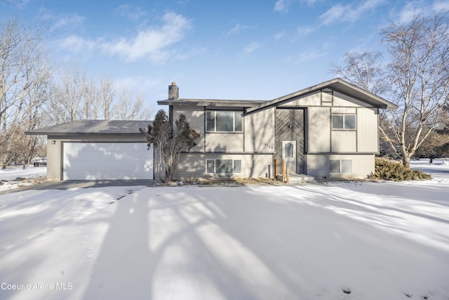 view of front of property featuring a garage