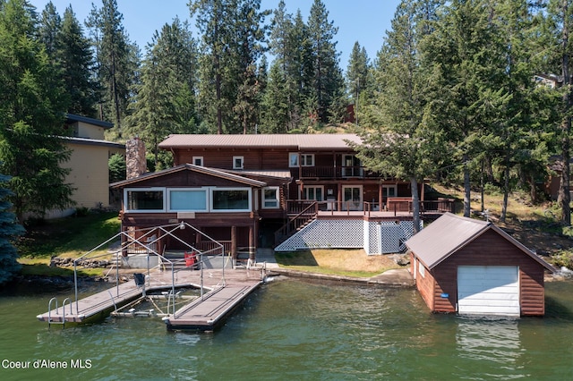 dock area featuring a deck with water view