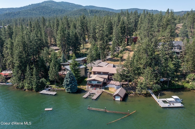 bird's eye view featuring a water and mountain view