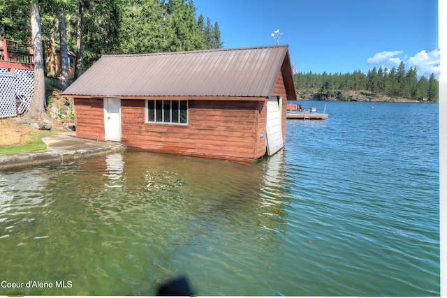 view of dock with a water view