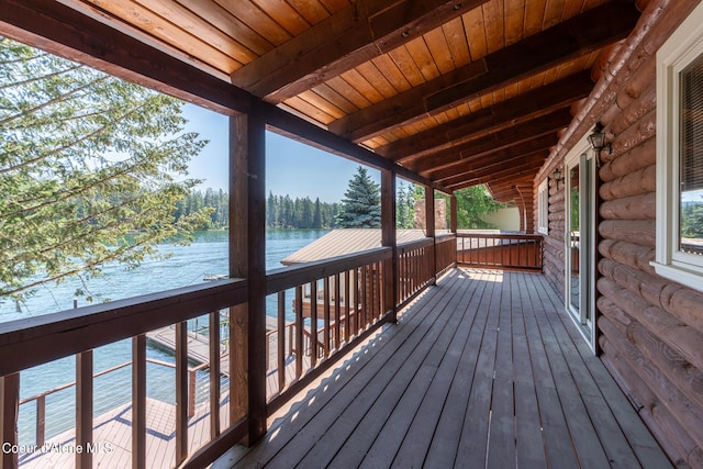 wooden terrace with a water view