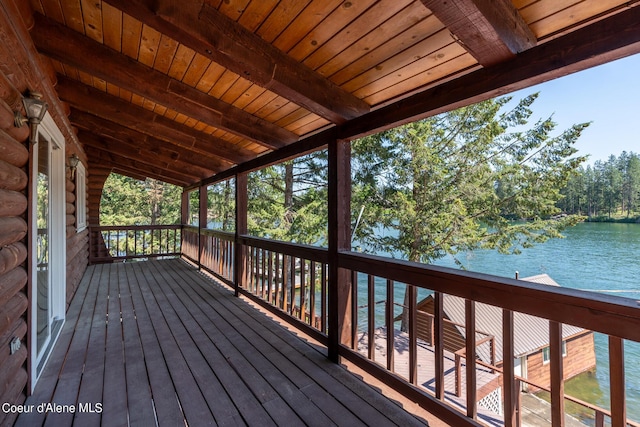 deck featuring a water view