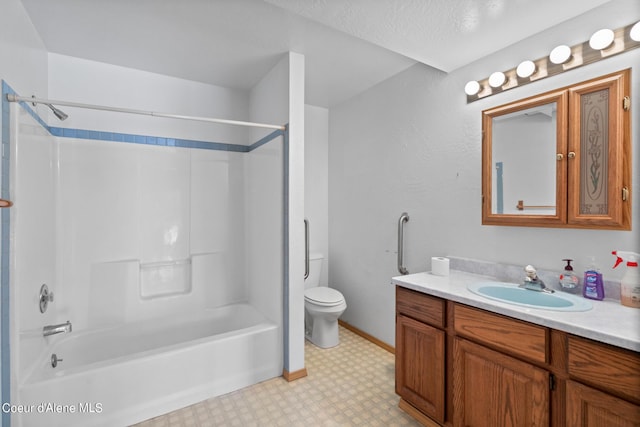 full bathroom featuring shower / bathing tub combination, vanity, and toilet