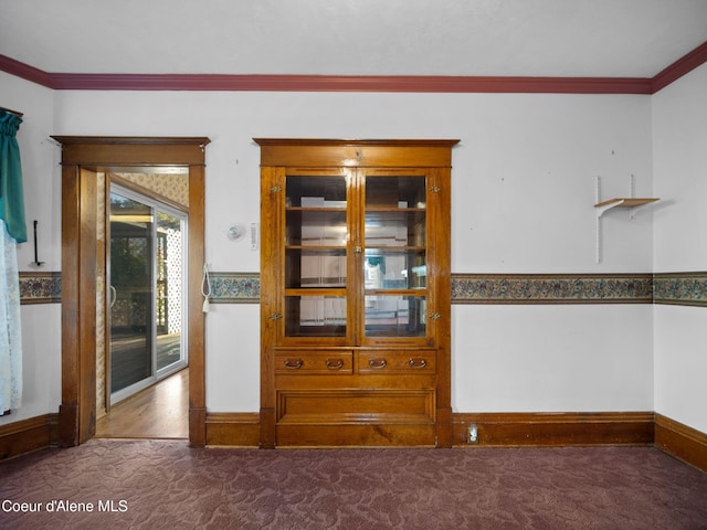 interior space featuring crown molding