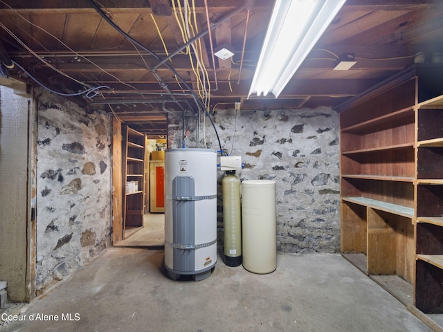 basement featuring secured water heater